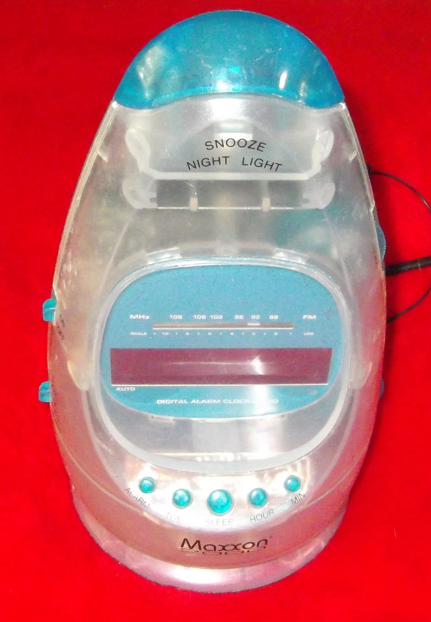 Maxxon Transparent Radio Alarm Clock 2000