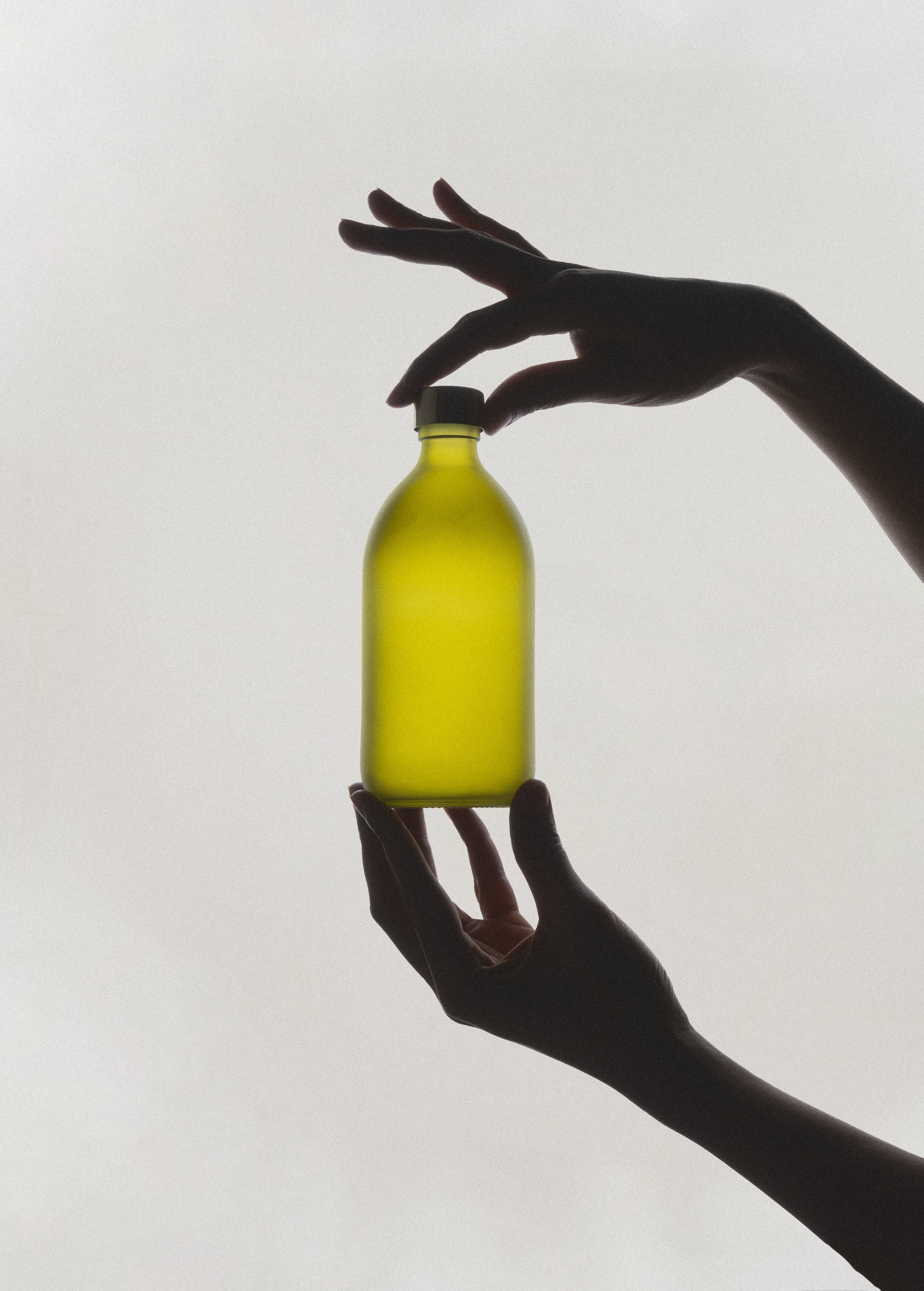 Botella de almacenamiento de vidrio verde Kuishi con tapa rosca